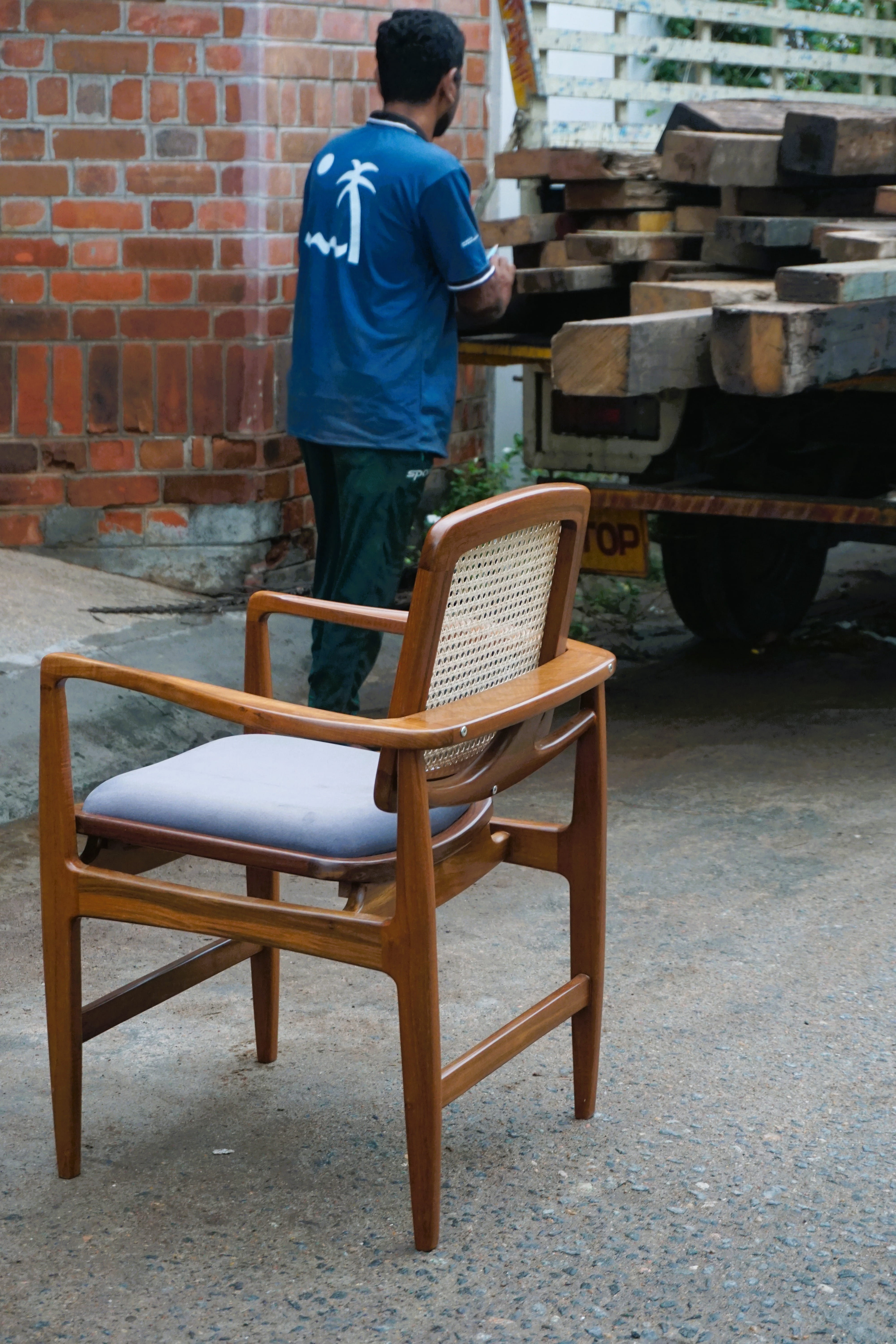 Craftsman shaping joinery on a bespoke furniture component
