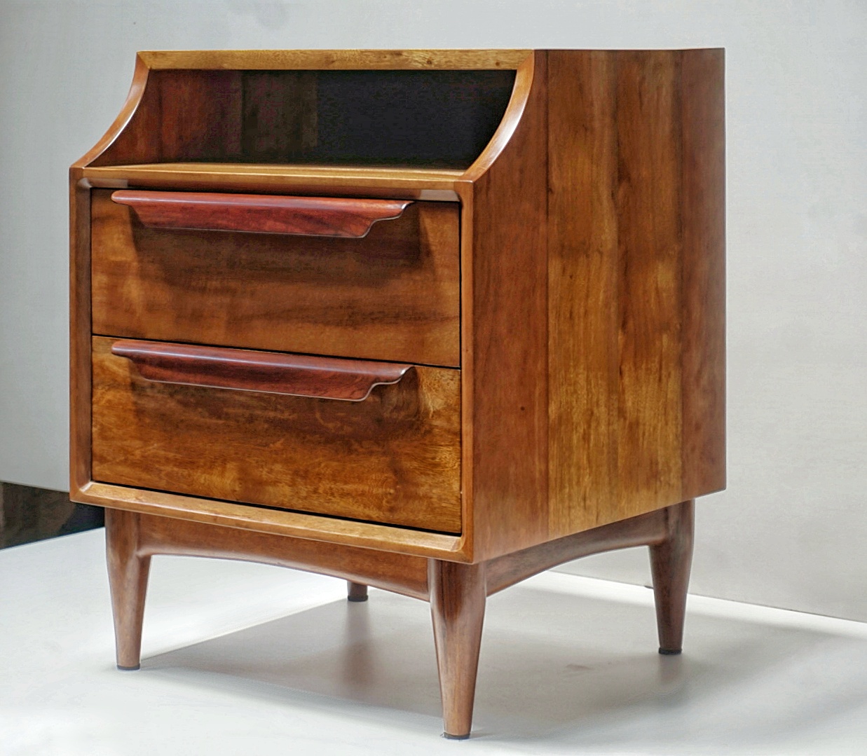 Low-VOC finish being applied to handcrafted furniture